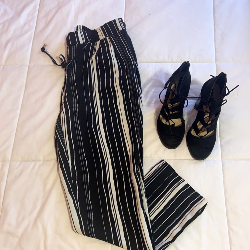 Black and white Pants perfect for casual wear or dressing up.
